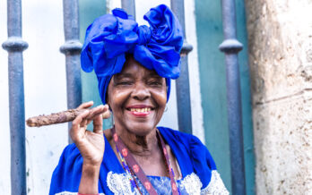 Cuban woman holding a cigar